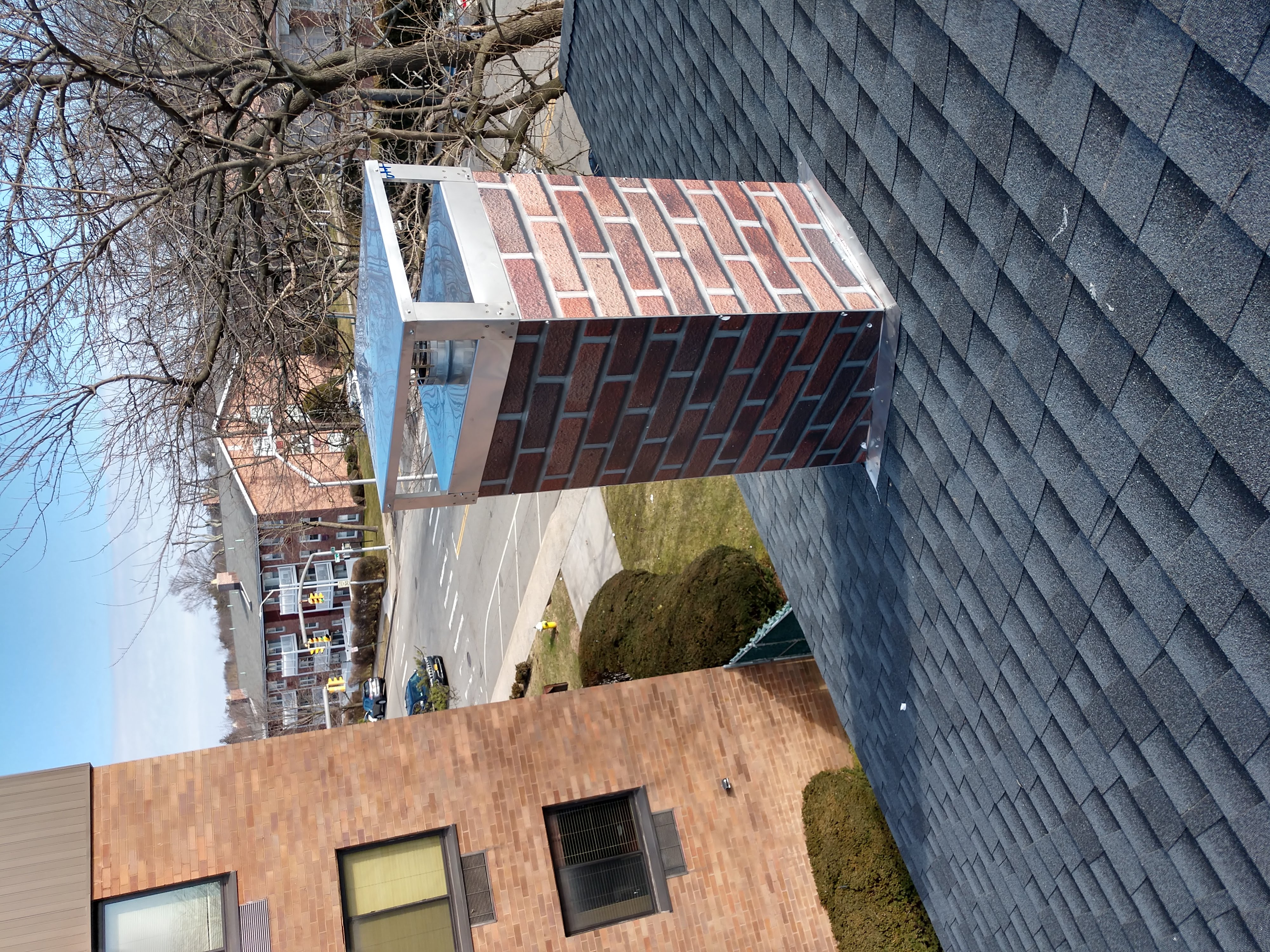 New elastomeric sealant applied to chimney crown in Port Washington, NY