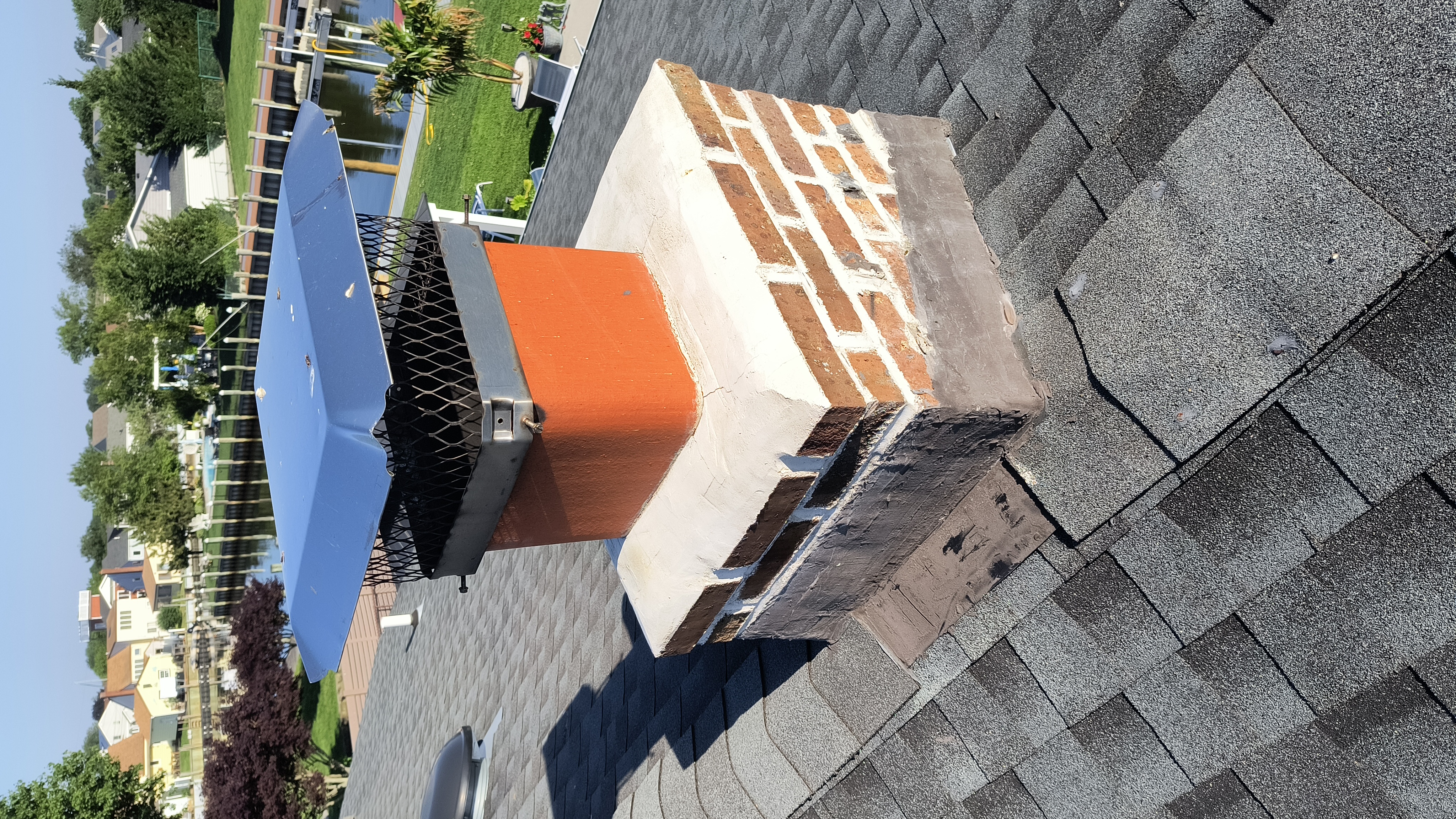Full chimney masonry rebuild and restoration in Port Washington, NY