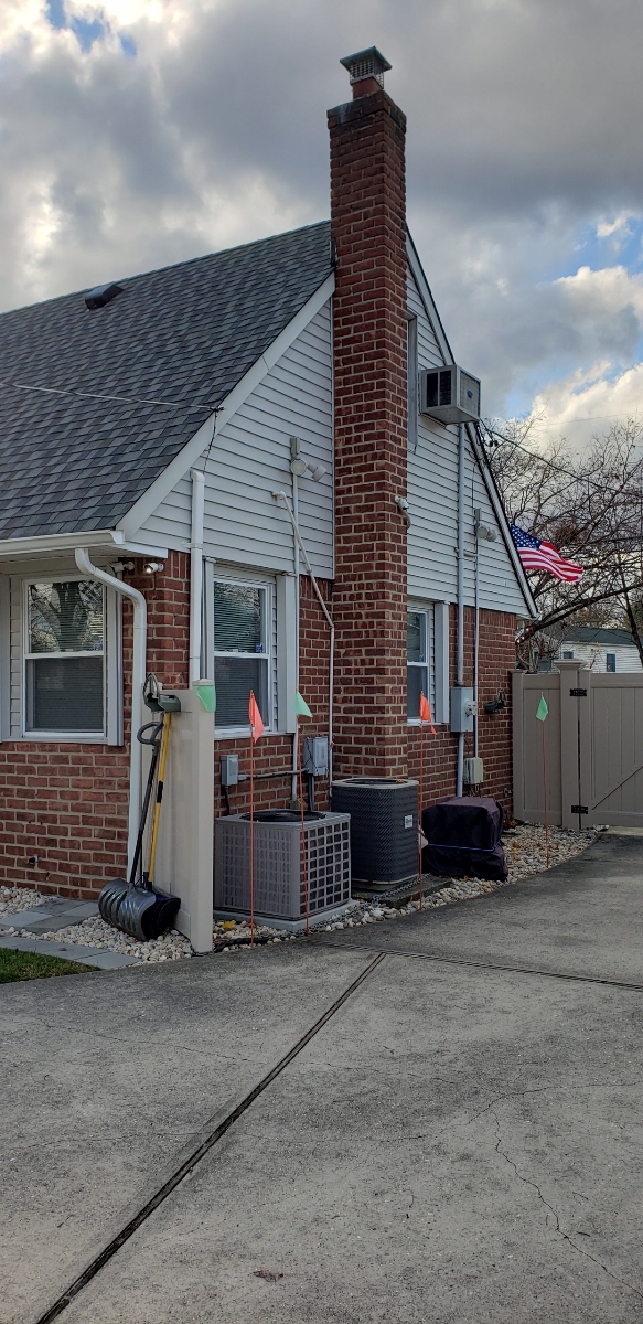 Professional chimney repointing restoring brick joints in Port Washington, NY