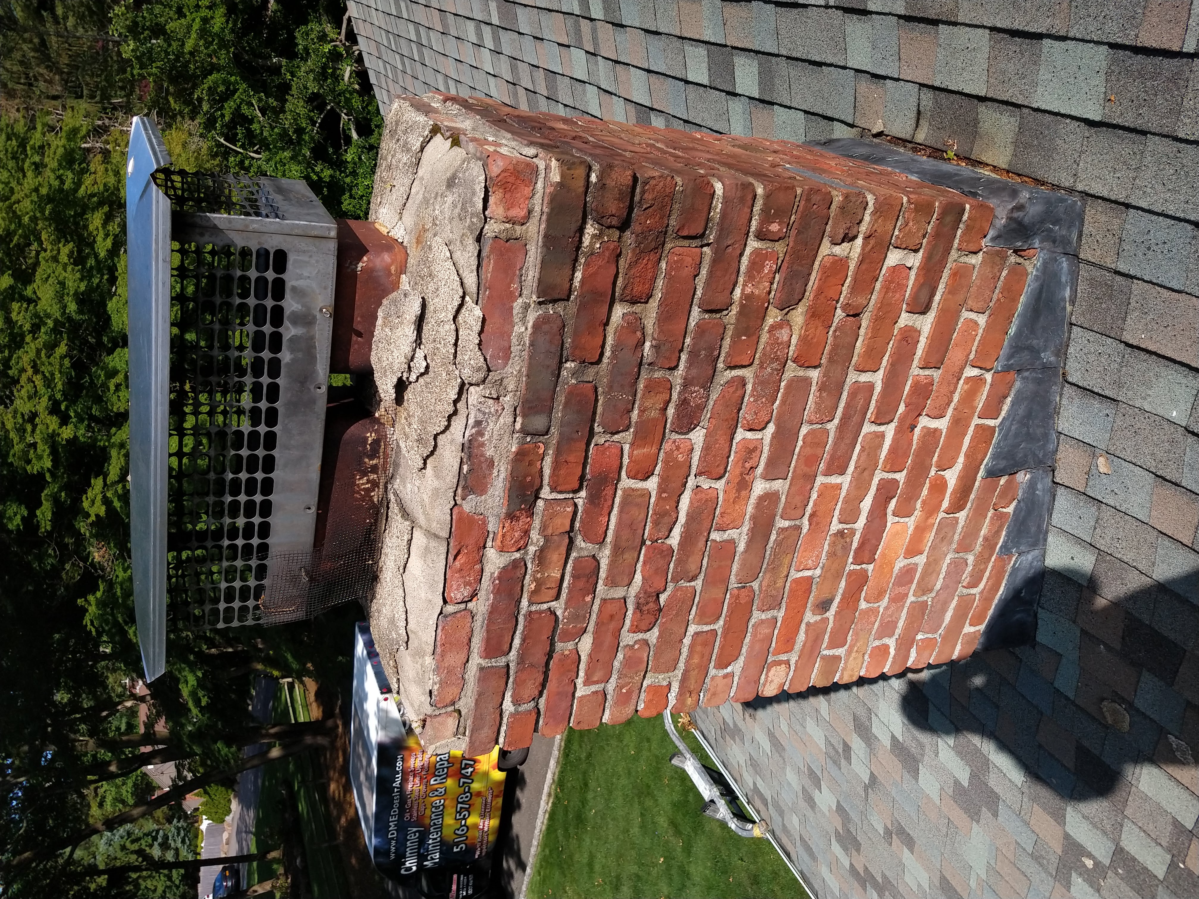 Cracked chimney crown professionally repaired in Port Washington, New York